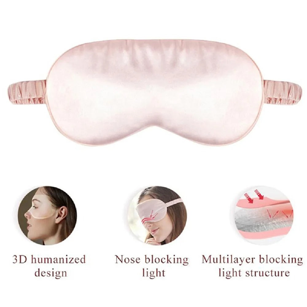 Pink sleep mask with features highlighted on a white background